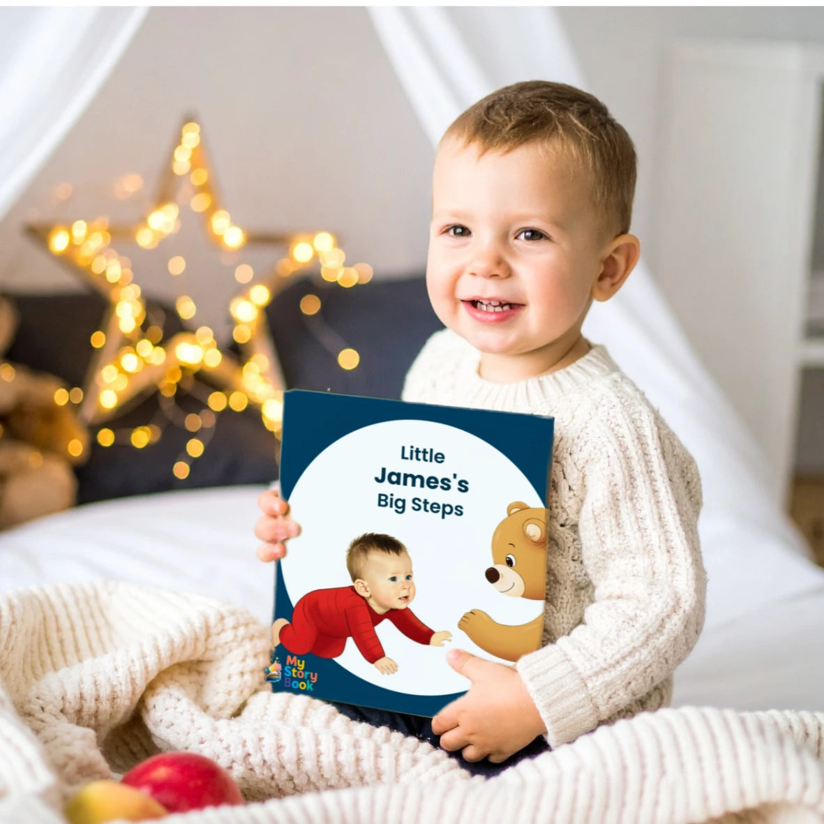 A boys happ reaction on the little James Big Steps personalised storybook gift