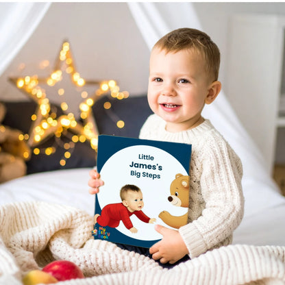 A boys happ reaction on the little James Big Steps personalised storybook gift